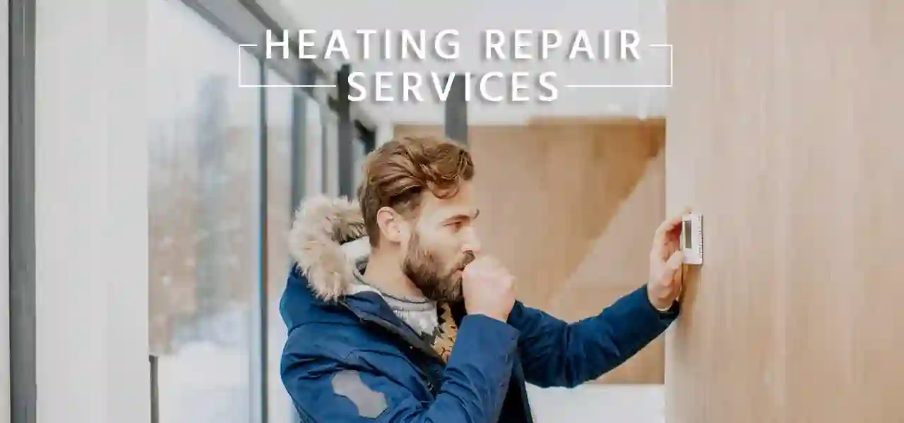 Man Wearing a Jacket at His Home Setting the Thermostat’s Temperature