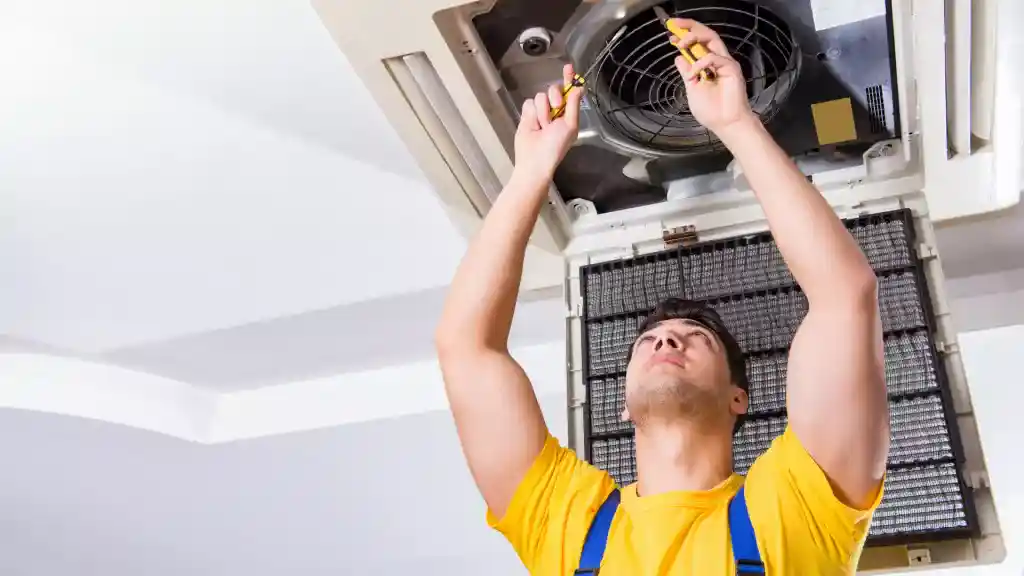 AC Professional Repairing a Houston Home's Duct Work