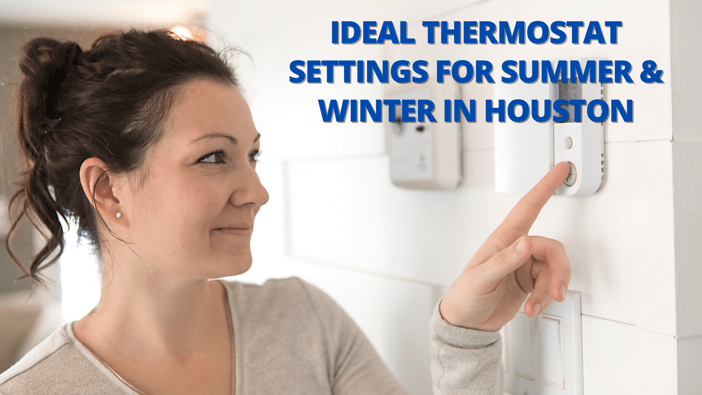 Woman Adjusting the Thermostat Temperature