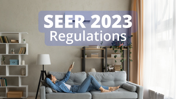 Woman on her sofa holding AC remote