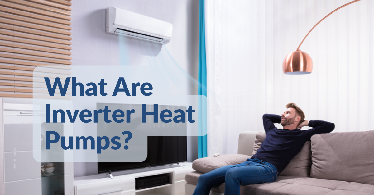 Man Sitting Comfortably on a Sofa Looking at an AC on the Wall