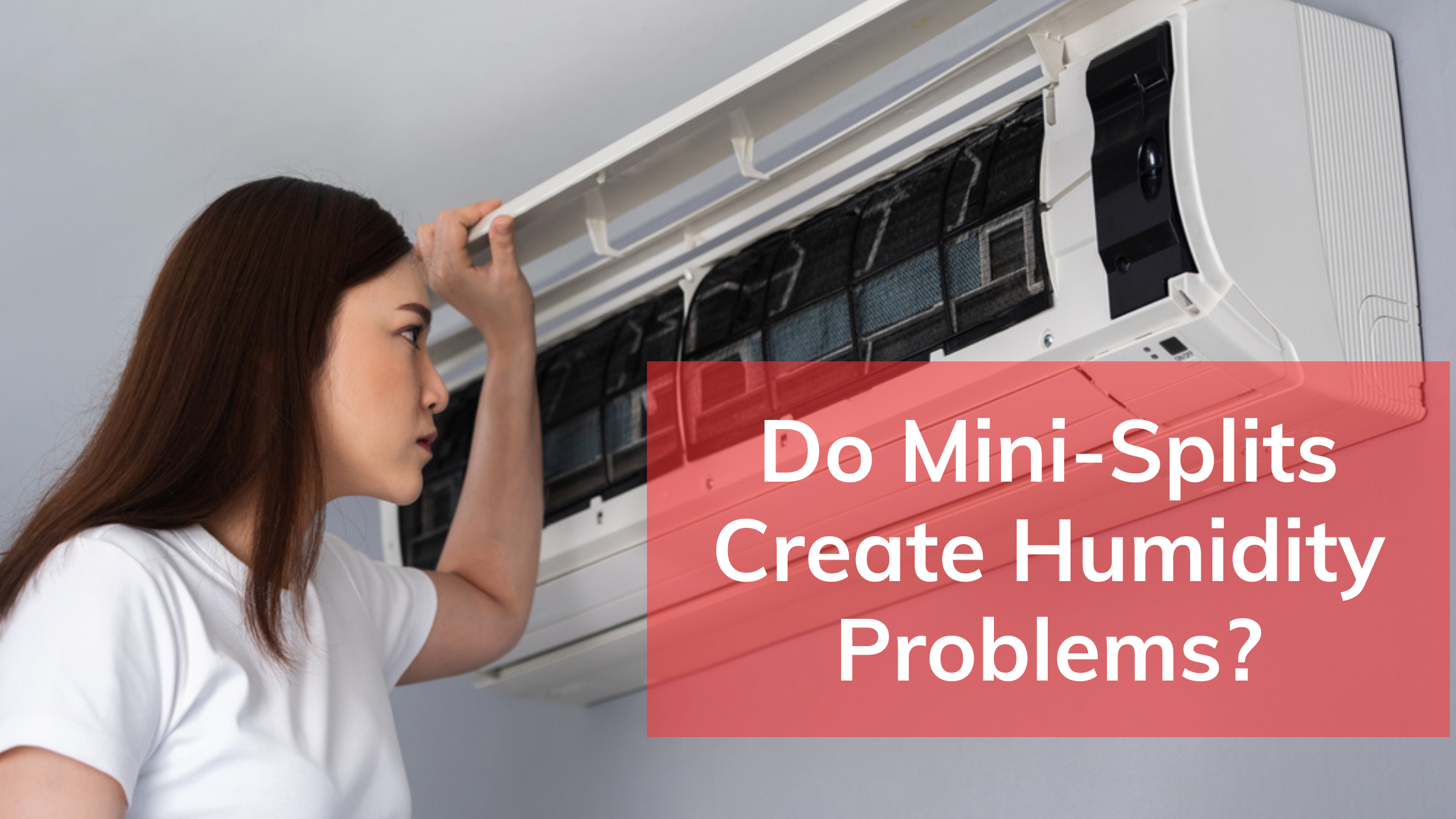 Young Woman Inspecting an AC Unit
